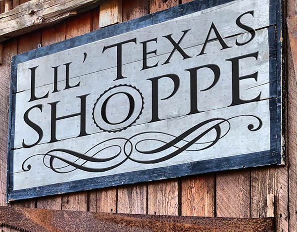 The hand-painted Lil' Texas Shoppe sign